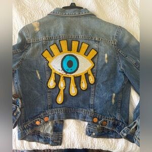H&M Divided Evil Eye Jean jacket. Sequin eye on back. small size 100%cotton